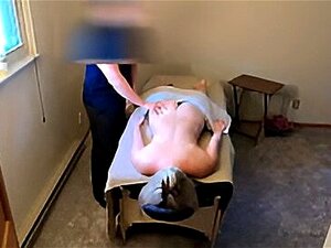 Witness a cheating wife's secret rendezvous during an intimate massage. This homemade video catches the raw passion and betrayal as she succumbs to temptation. Watch now!